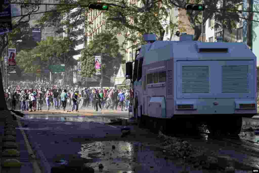 Manifestantes participan en una protesta contra el Gobierno de Nicolás Maduro