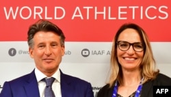 Ximena Restrepo y Sebastian Coe. AFP/ Giuseppe CACACE 